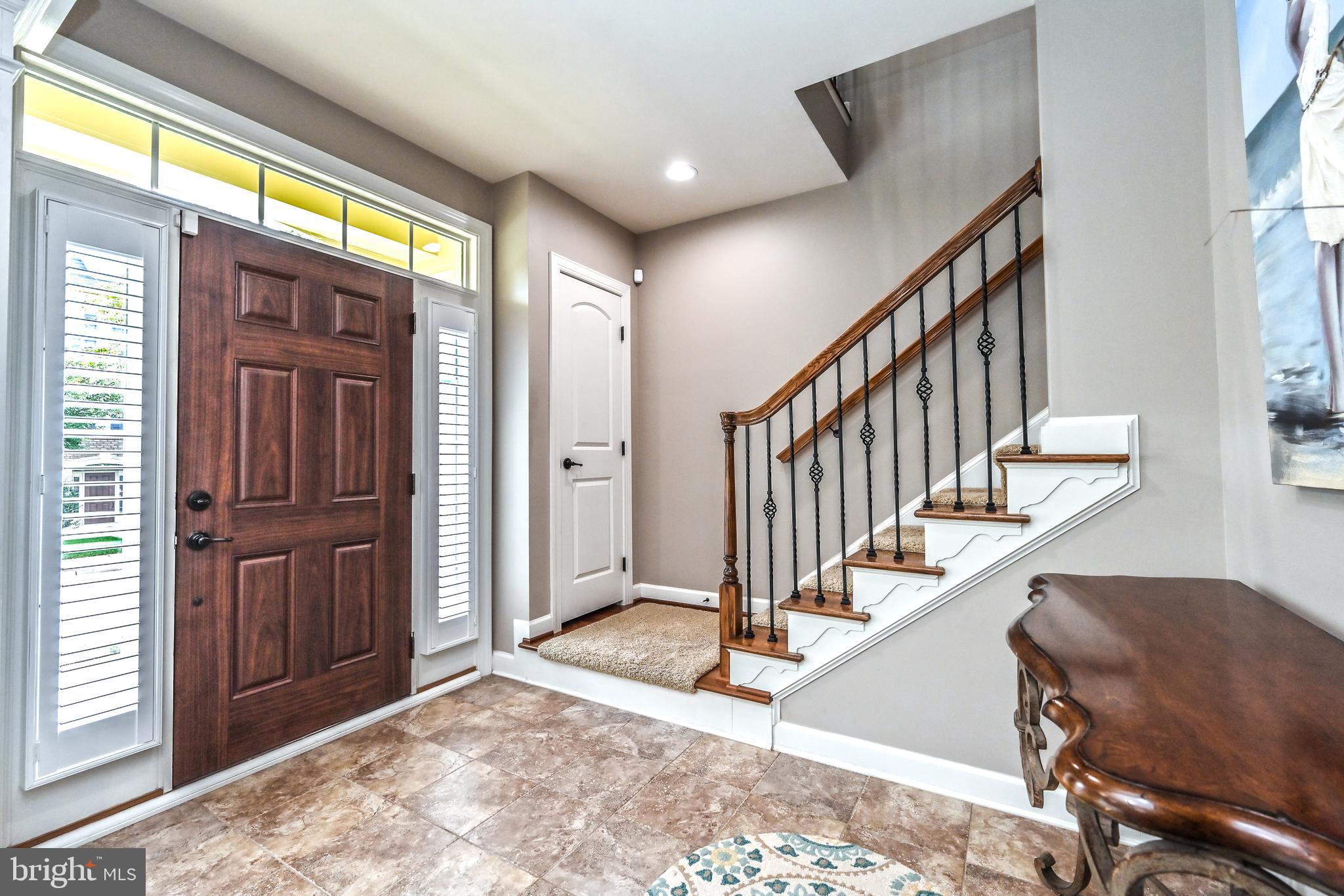 24947 Earlsford Drive Chantilly, VA 20152 - Photo 2 of 40 a view of an entryway with staircase
