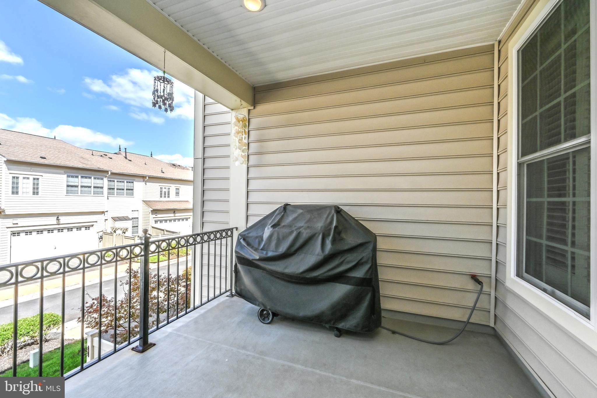 24947 Earlsford Drive Chantilly, VA 20152 - Photo 25 of 40 a view of a balcony with furniture