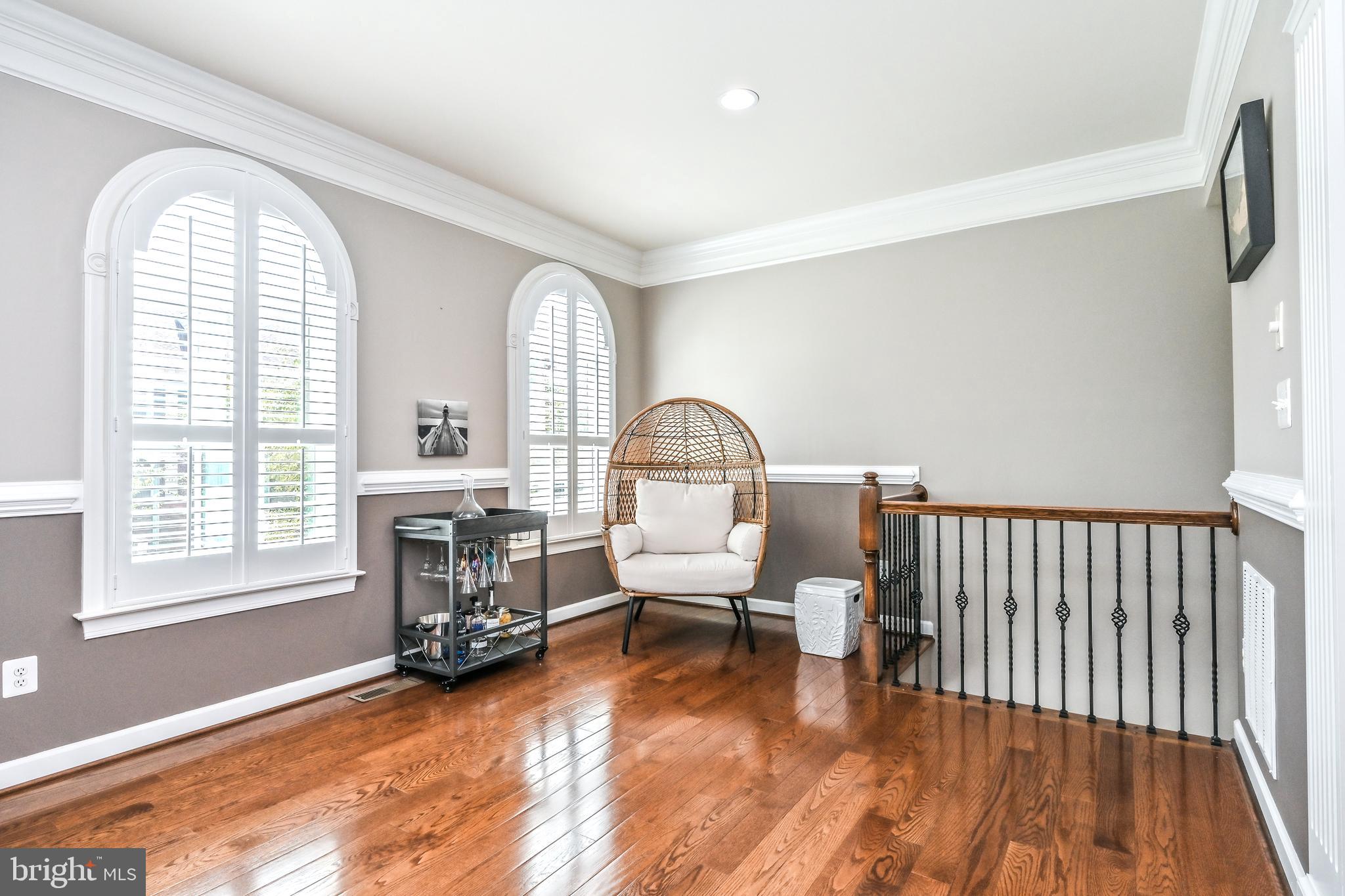 24947 Earlsford Drive Chantilly, VA 20152 - Photo 28 of 40 a living room with furniture and a window