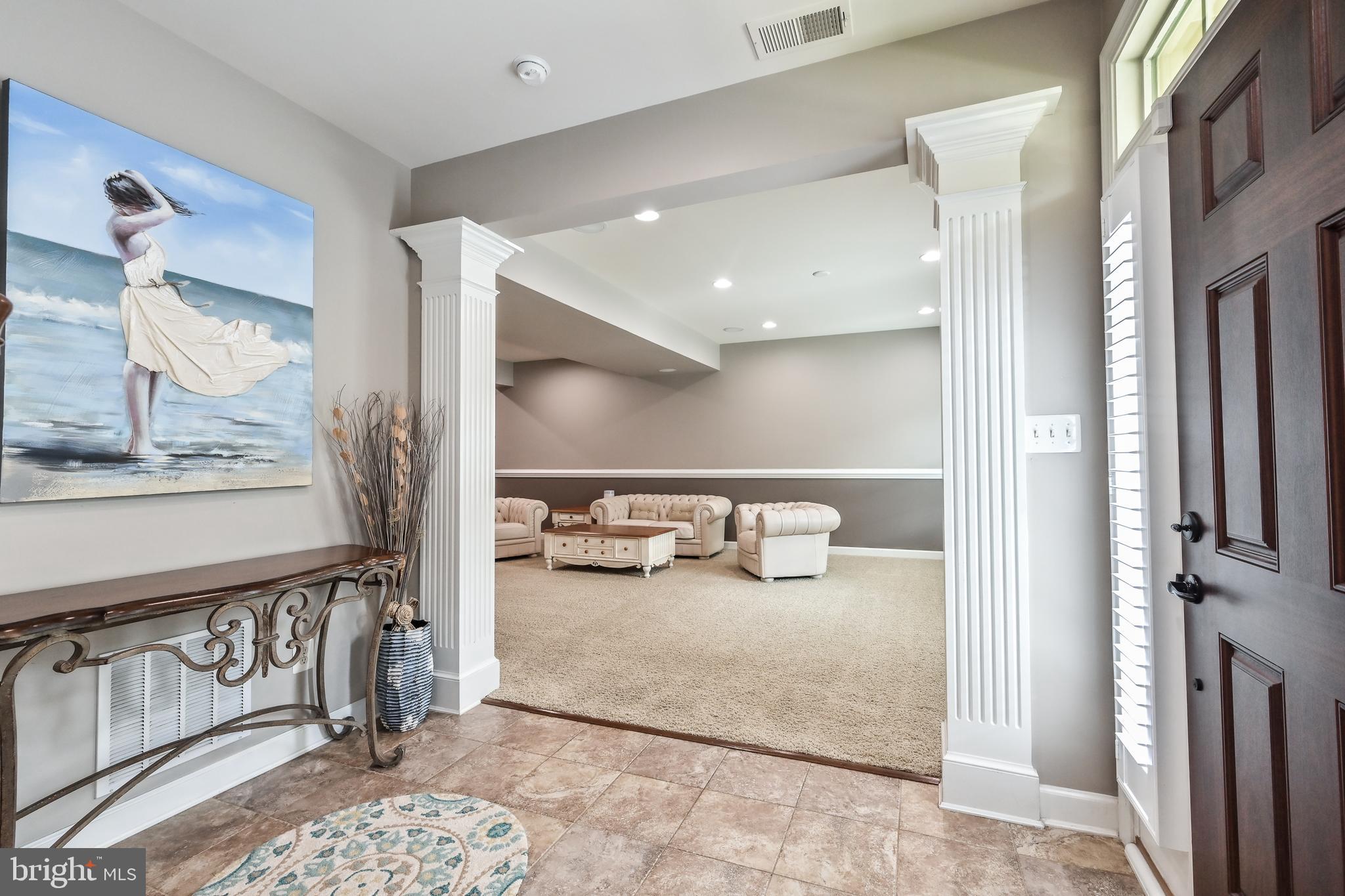 24947 Earlsford Drive Chantilly, VA 20152 - Photo 3 of 40 a view of a hallway with dining area