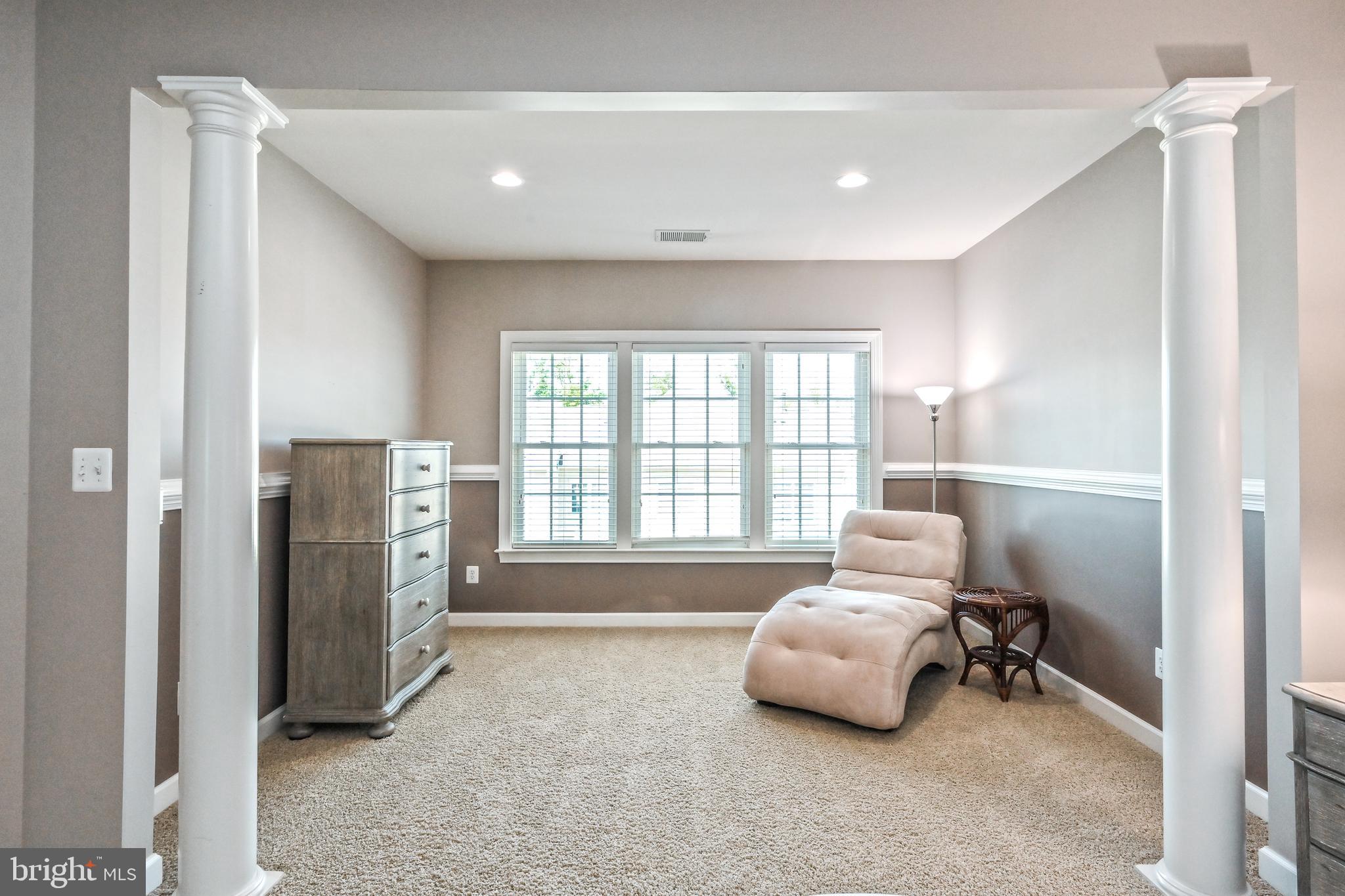24947 Earlsford Drive Chantilly, VA 20152 - Photo 36 of 40 a spacious bedroom with a bed and a window