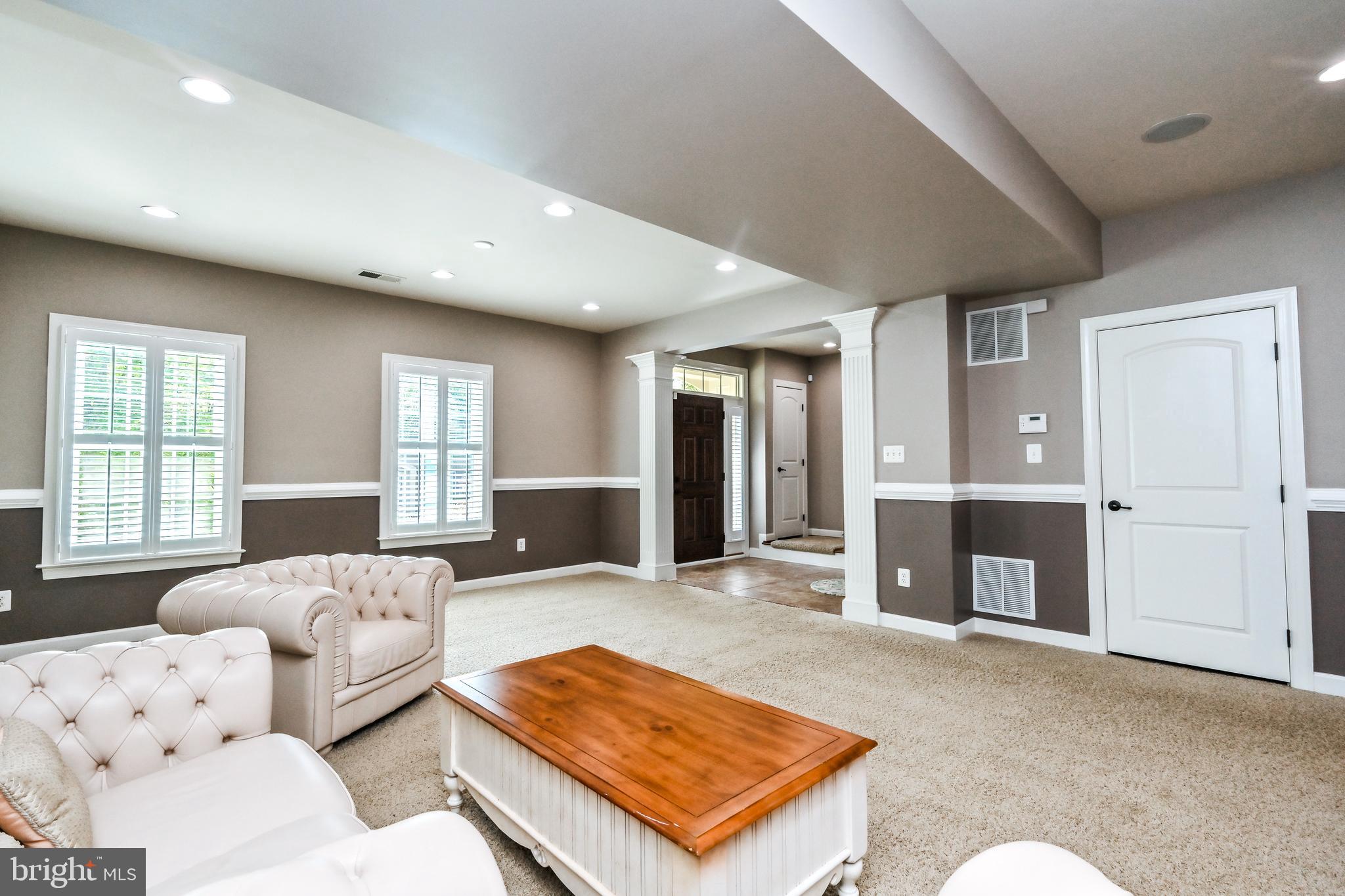 24947 Earlsford Drive Chantilly, VA 20152 - Photo 5 of 40 a living room with furniture rug and window