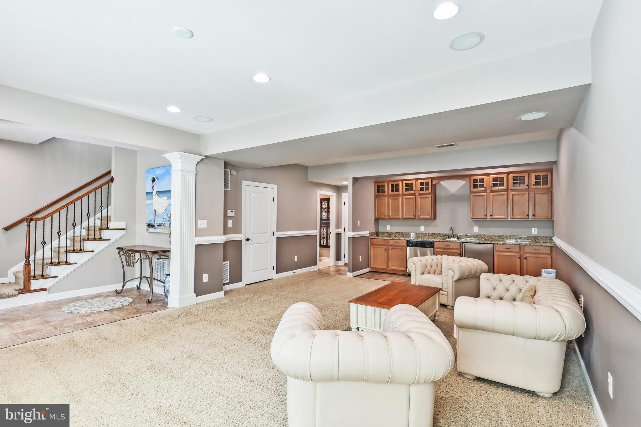 24947 Earlsford Drive Chantilly, VA 20152 - Photo 6 of 40 a living room with furniture and a large window