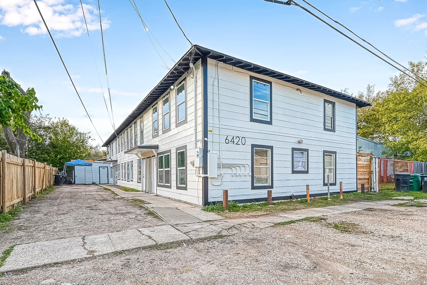 6420 Conley Street, Unit 4 Houston, TX 77021 - Photo 5 of 27 a front view of a house with a yard