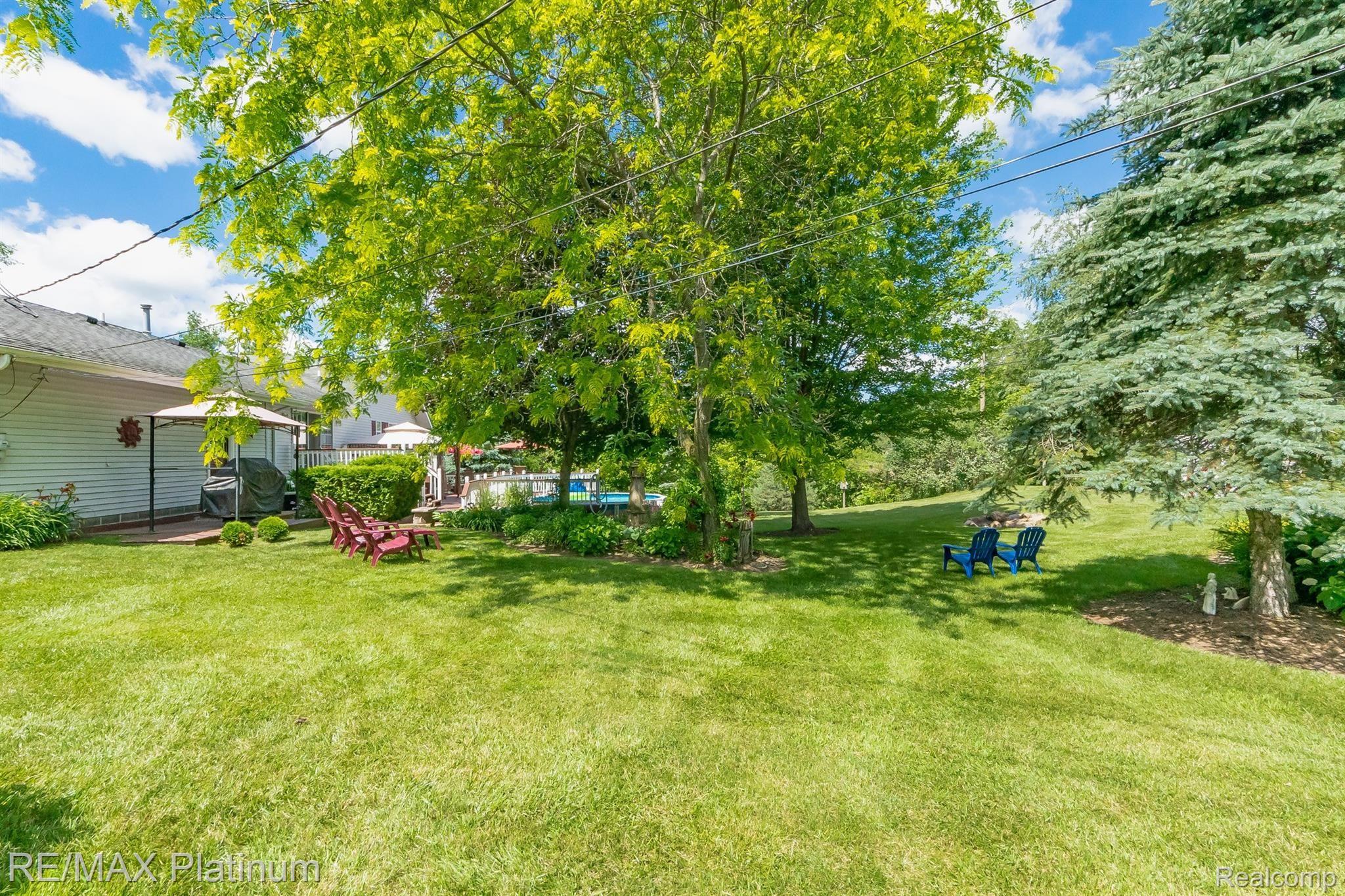 3738 West Schafer Road Pinckney, MI 48169 - Photo 51 of 75 Yard showing patio and pool.