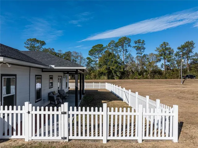 a view of a livingroom with furniture and window