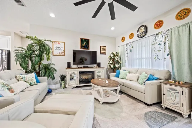 a kitchen with stainless steel appliances granite countertop a refrigerator and microwave