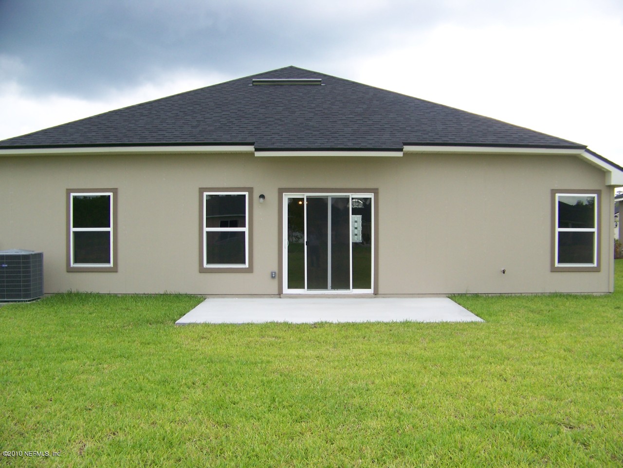 1867 Reed Valley Way, Unit AZALEA RIDGE LOT 133 Middleburg, FL 32068 - Photo 13 of 17 a front view of house with yard