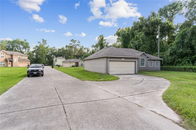 a house view with a garden space