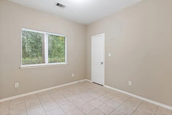a view of an empty room with window