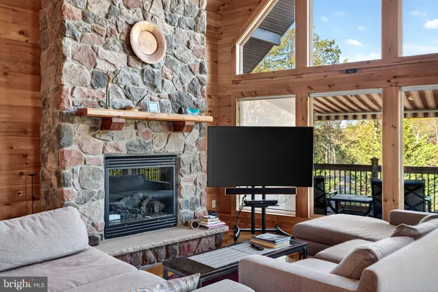 a view of a swimming pool with chairs