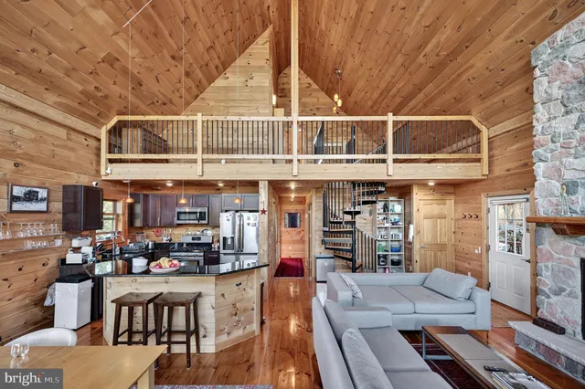 a view of a backyard with ceiling fan