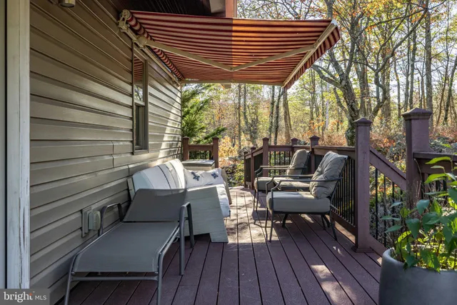 a view of balcony with wooden floor