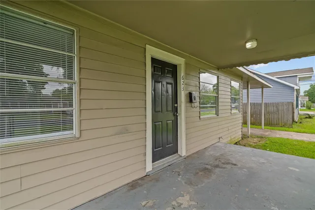a view of outdoor space and front view of a house