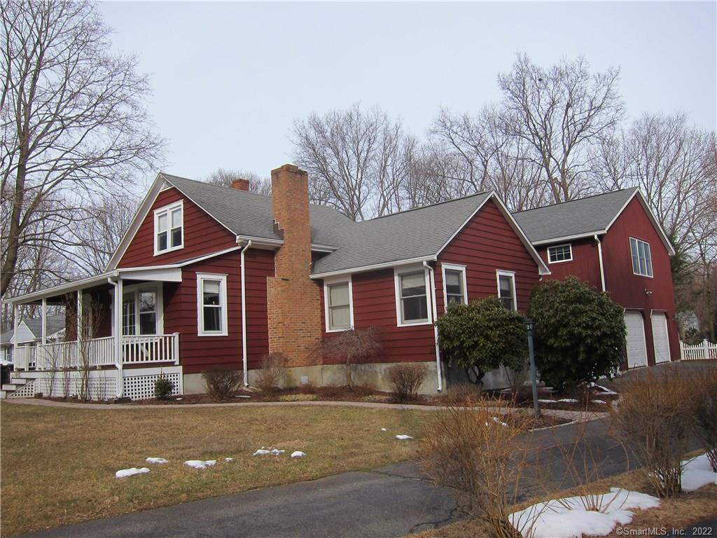 11 Robinwood Road Trumbull, CT 06611 - Photo 1 of 1 a front view of a house with a yard