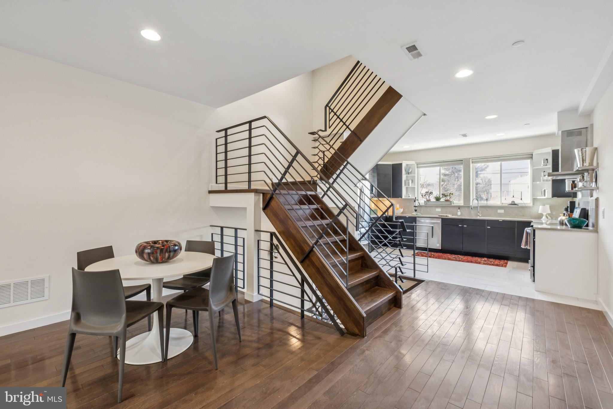 1189 South 21st Street Philadelphia, PA 19146 - Photo 11 of 30 a living room with furniture and a wooden floor