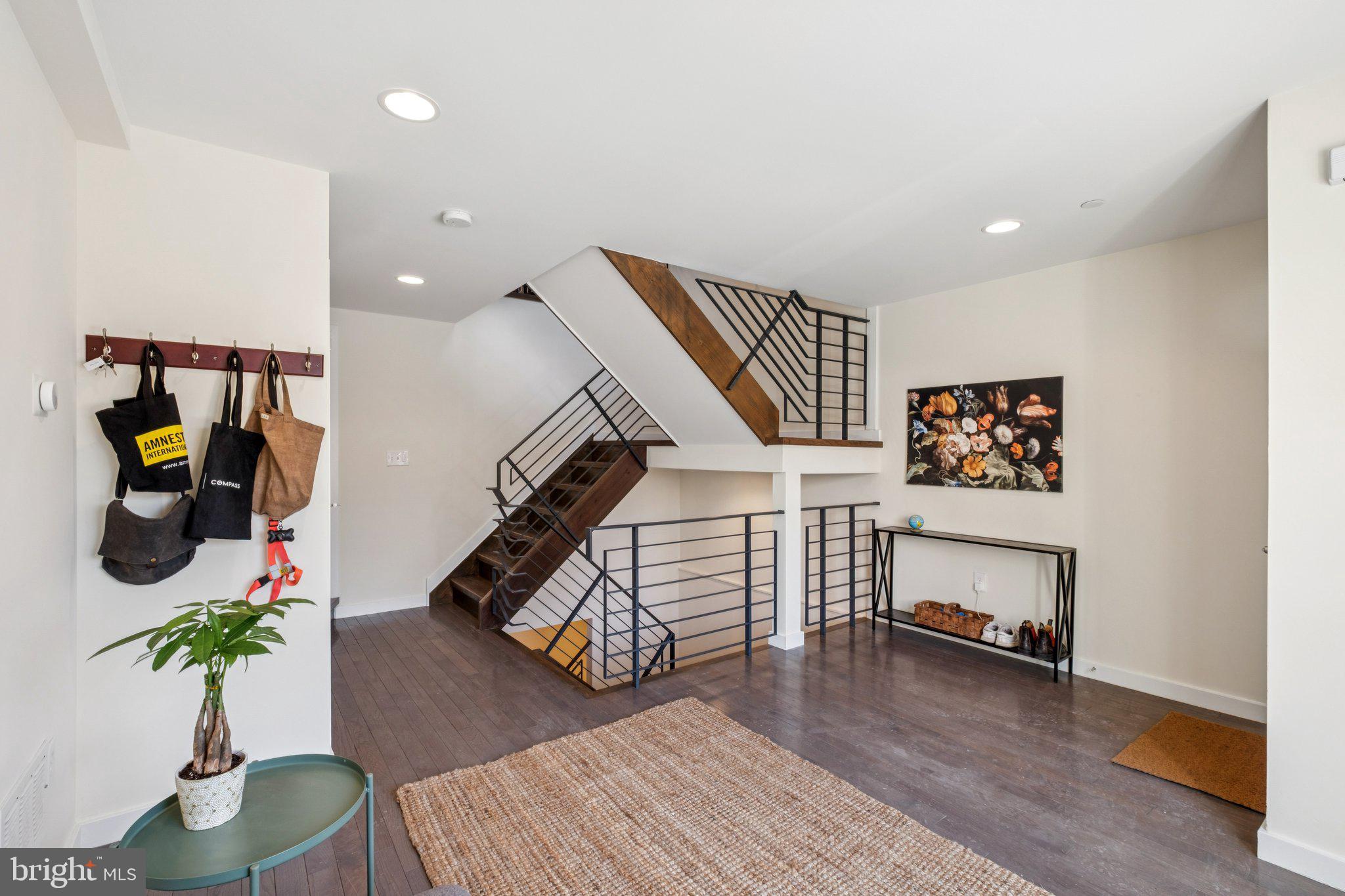 1189 South 21st Street Philadelphia, PA 19146 - Photo 5 of 30 a living room with furniture and wooden floor