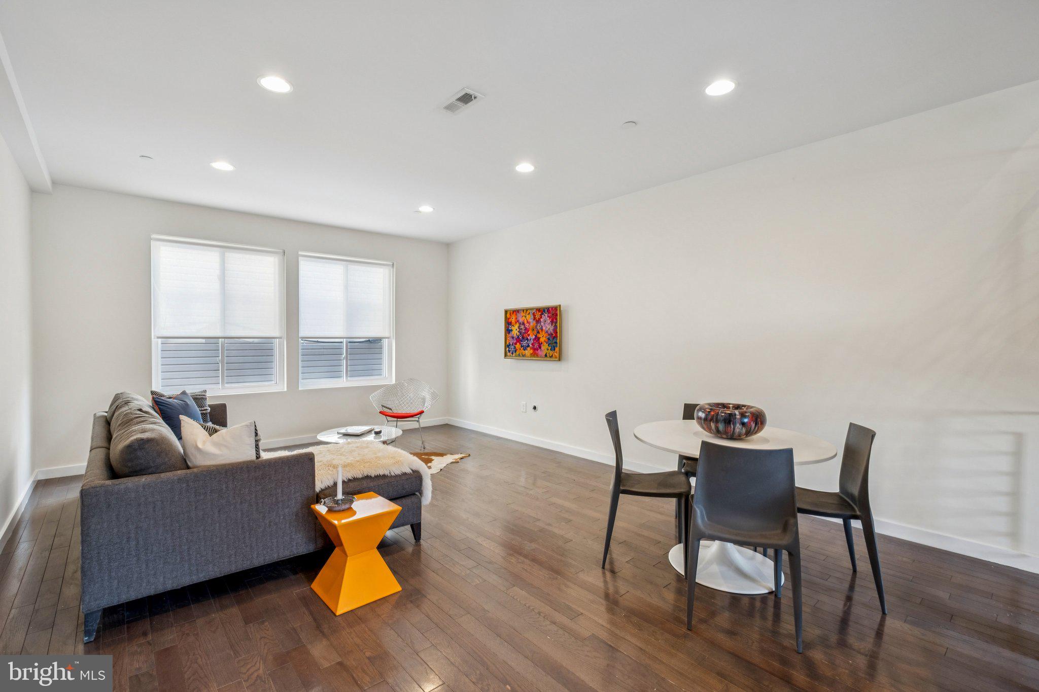1189 South 21st Street Philadelphia, PA 19146 - Photo 9 of 30 a living room with furniture and a table
