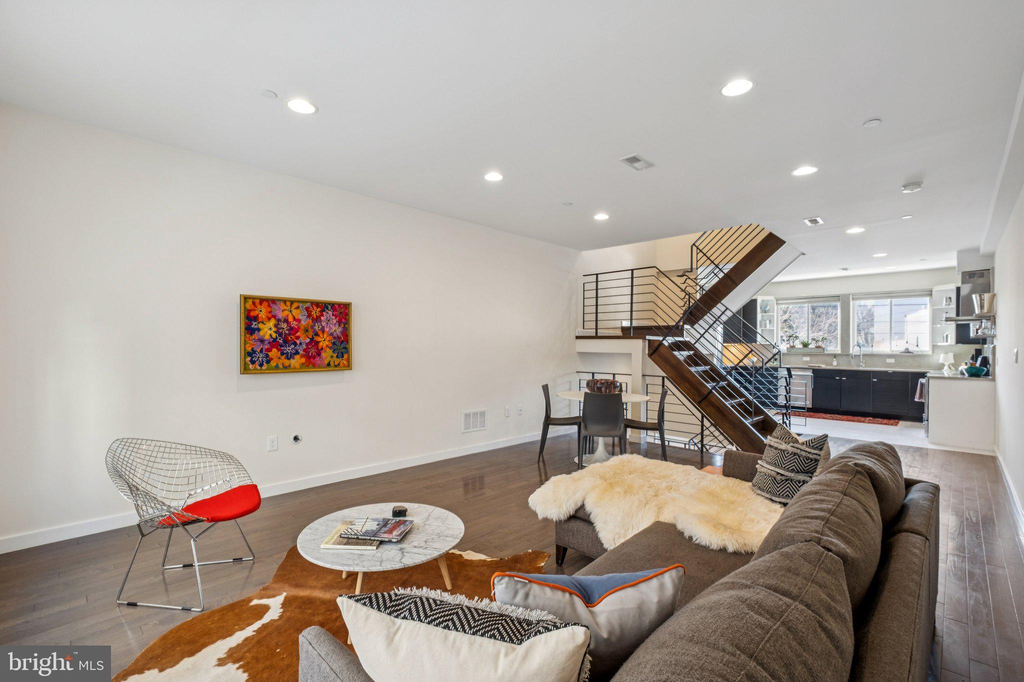 1189 South 21st Street Philadelphia, PA 19146 - Photo 10 of 30 a living room with furniture and a wooden floor