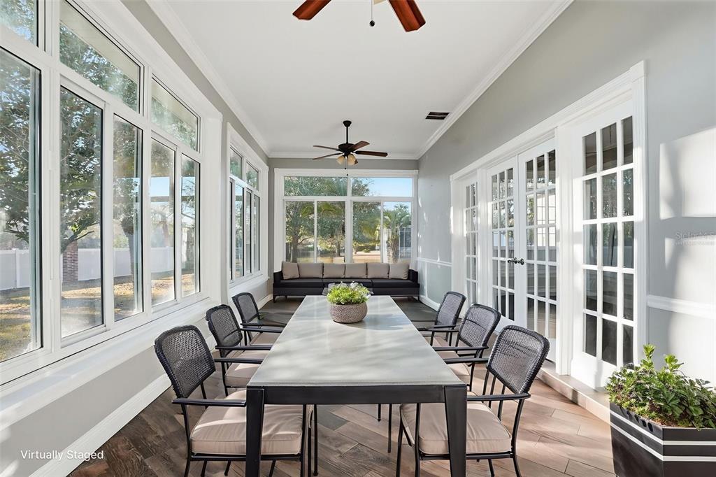4495 Secretariat Run Spring Hill, FL 34609 - Photo 16 of 43 a view of a dining room with furniture window and outside view