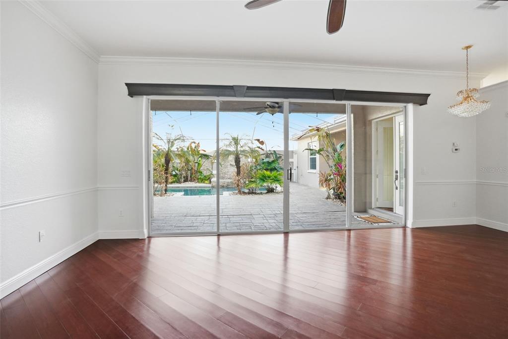 4495 Secretariat Run Spring Hill, FL 34609 - Photo 30 of 43 wooden floor in an empty room with a window
