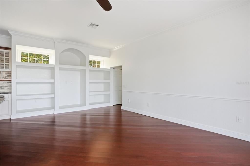 4495 Secretariat Run Spring Hill, FL 34609 - Photo 32 of 43 a view of empty room with wooden floor