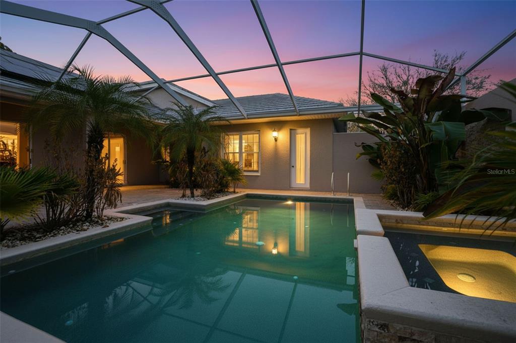 4495 Secretariat Run Spring Hill, FL 34609 - Photo 38 of 43 a view of a swimming pool with a patio