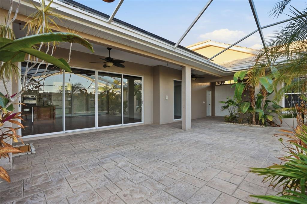 4495 Secretariat Run Spring Hill, FL 34609 - Photo 41 of 43 a view of a building with a door and a porch