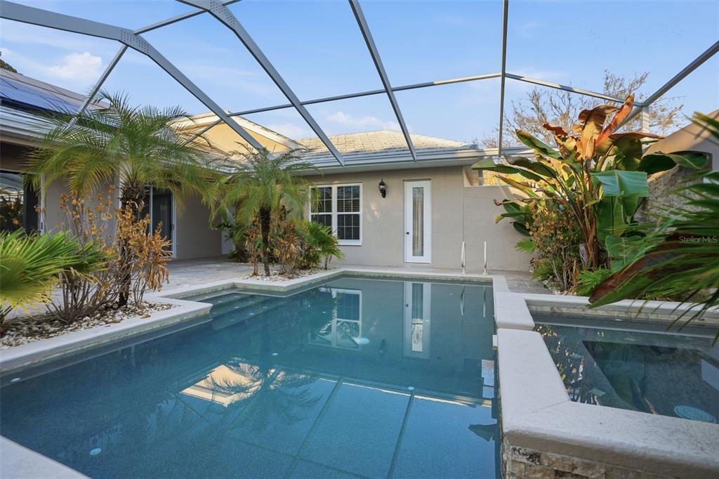 4495 Secretariat Run Spring Hill, FL 34609 - Photo 42 of 43 a swimming pool with outdoor seating