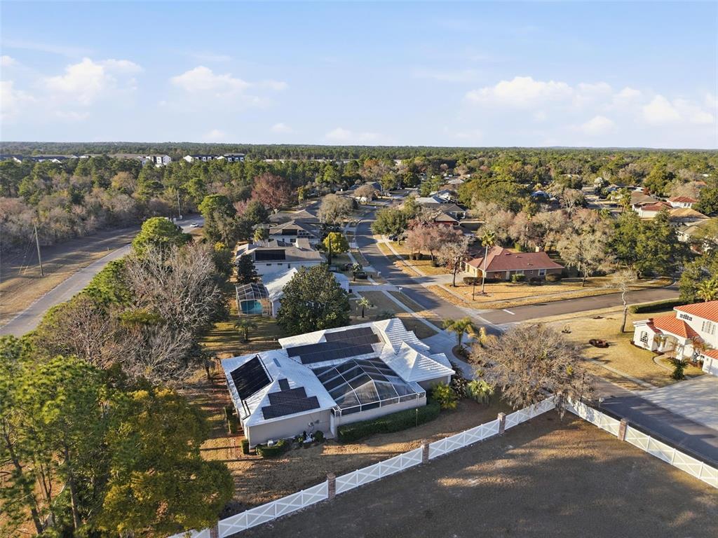 4495 Secretariat Run Spring Hill, FL 34609 - Photo 5 of 43 an aerial view of a city with lots of residential buildings