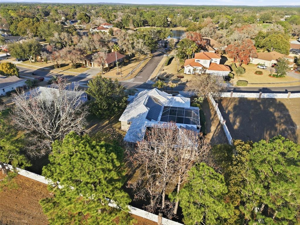 4495 Secretariat Run Spring Hill, FL 34609 - Photo 6 of 43 an aerial view of residential houses with outdoor space