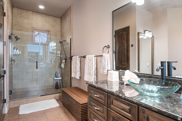 2376 Stone Crest Circle St. George, UT 84790 - Photo 26 of 61 Full bath featuring a stall shower, vanity, light tile patterned floors, and recessed lighting