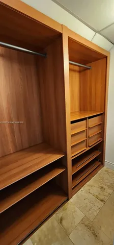 a bathroom with a tub and shower