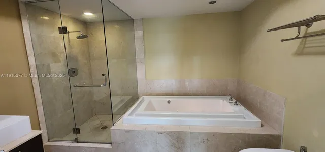 a bathroom with a toilet and a sink