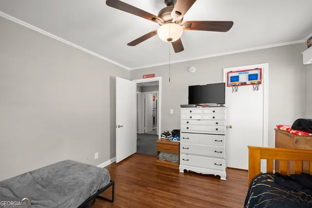 a room with furniture and flat screen tv