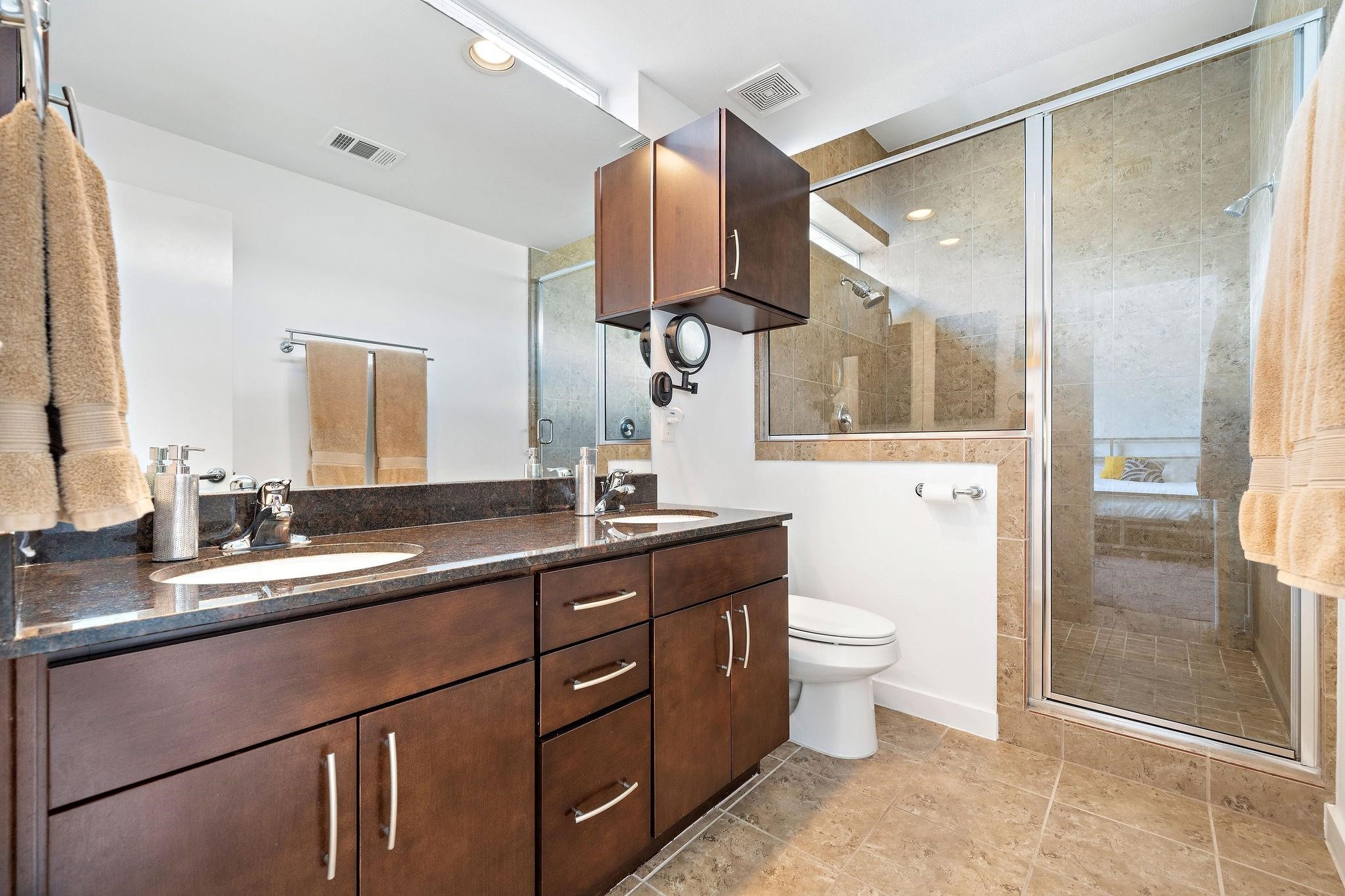 441 Meadow Street Houston, TX 77020 - Photo 15 of 20 a bathroom with a sink a toilet and shower