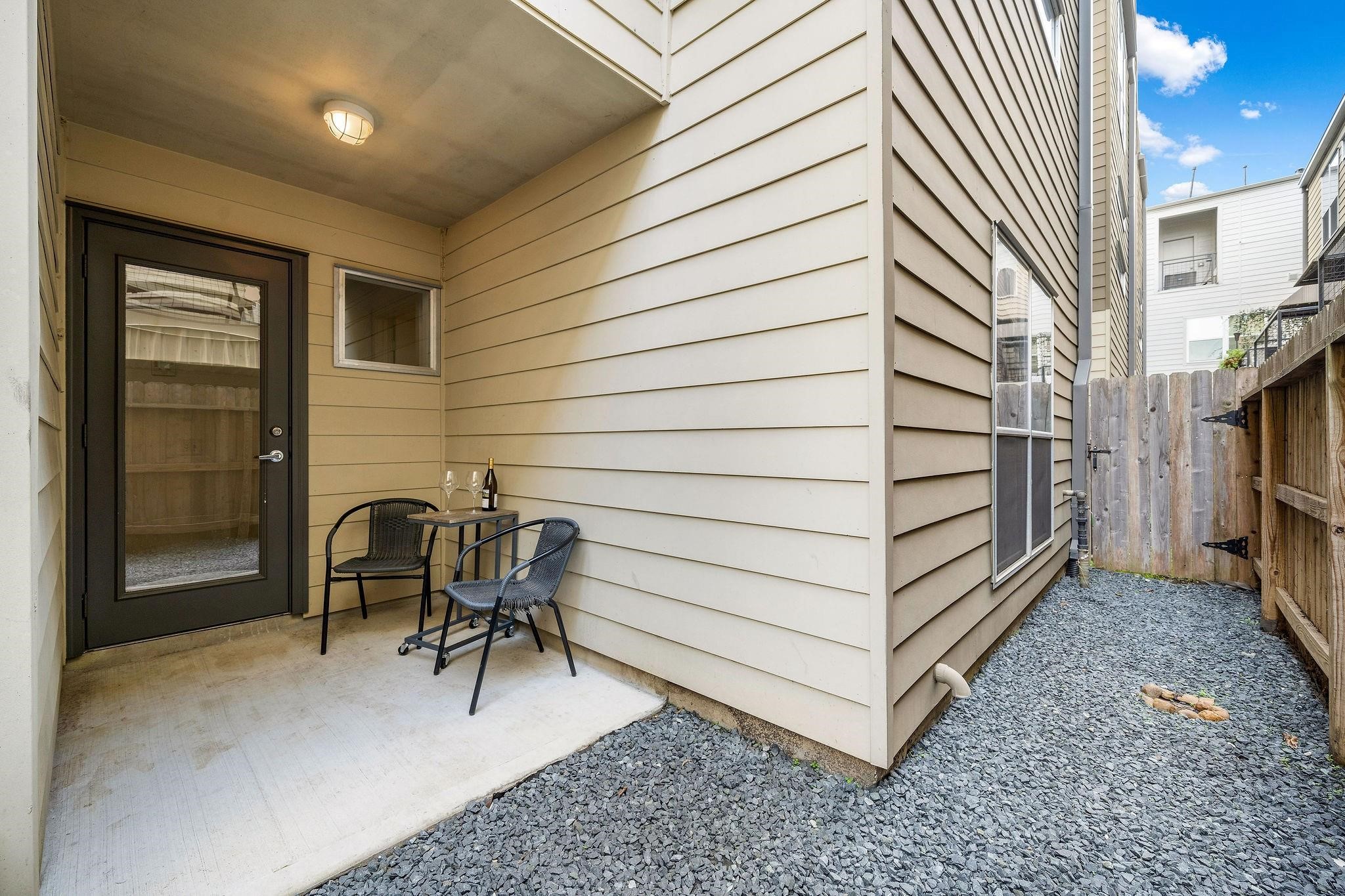 441 Meadow Street Houston, TX 77020 - Photo 19 of 20 a view of a patio with a chairs and table in a patio