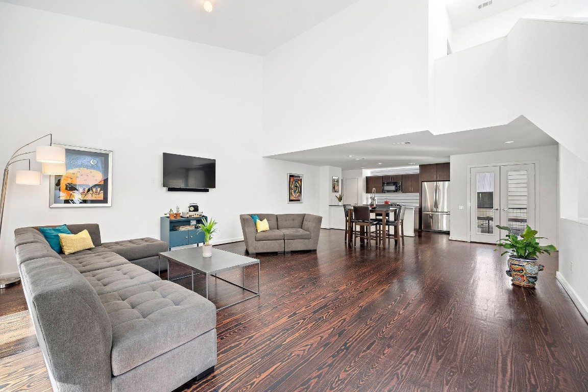 441 Meadow Street Houston, TX 77020 - Photo 6 of 20 a living room with furniture and a wooden floor