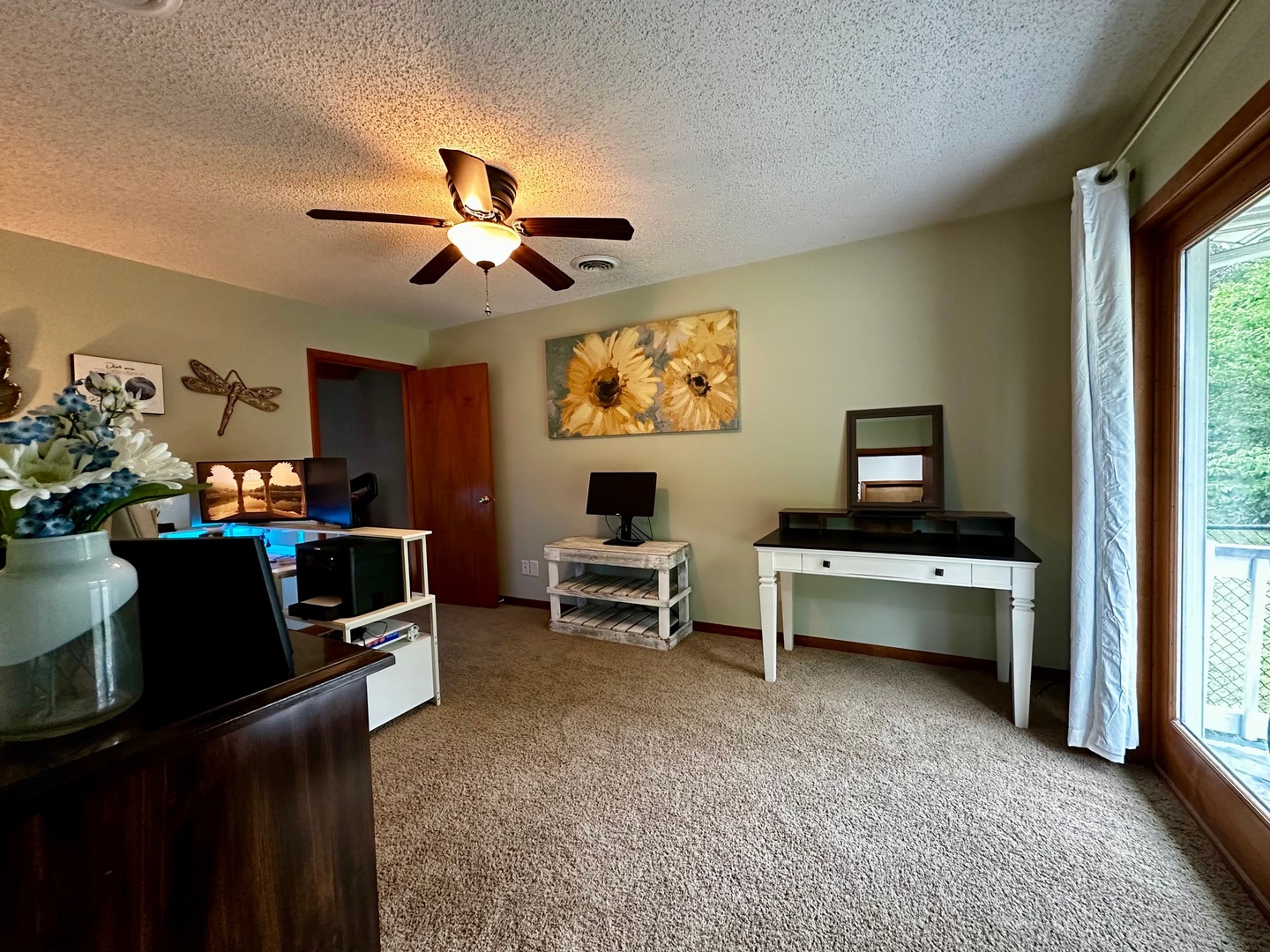 4100 416 North Clinton, IL 61727 - Photo 19 of 33 a living room with furniture and a window