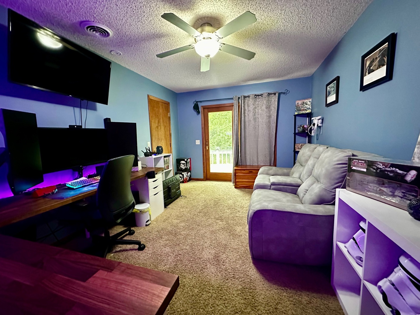 4100 416 North Clinton, IL 61727 - Photo 20 of 33 a living room with furniture and a flat screen tv
