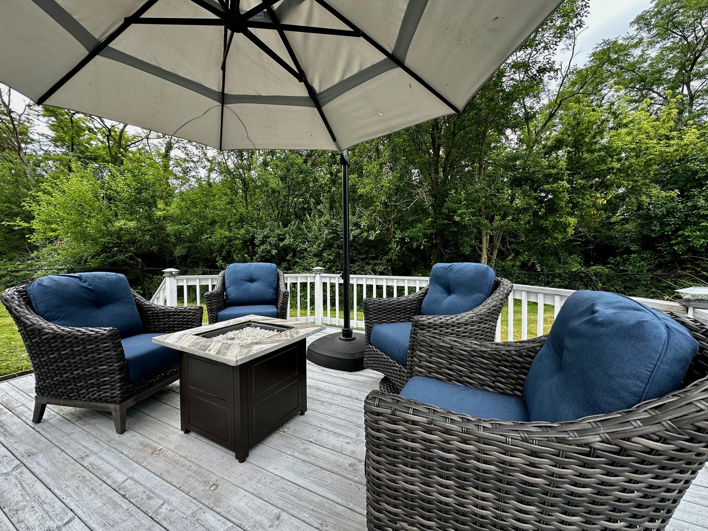 4100 416 North Clinton, IL 61727 - Photo 26 of 33 a view of outdoor sitting area with furniture and umbrella