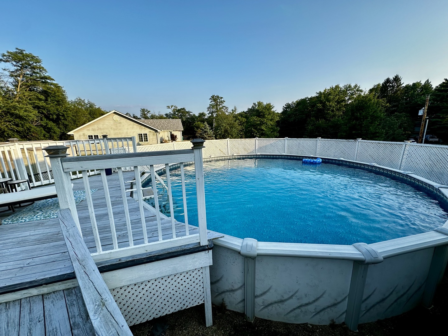 4100 416 North Clinton, IL 61727 - Photo 29 of 33 a view of a roof deck with wooden floor and fence