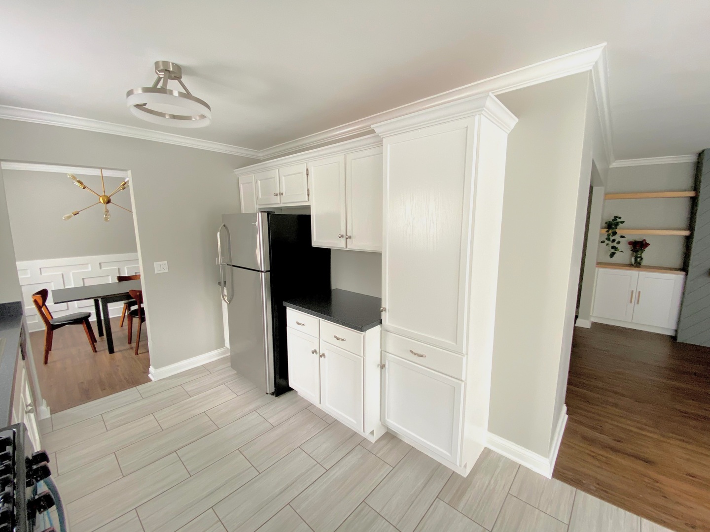 1214 Needham Road Naperville, IL 60563 - Photo 15 of 25 a living room with furniture and a flat screen tv