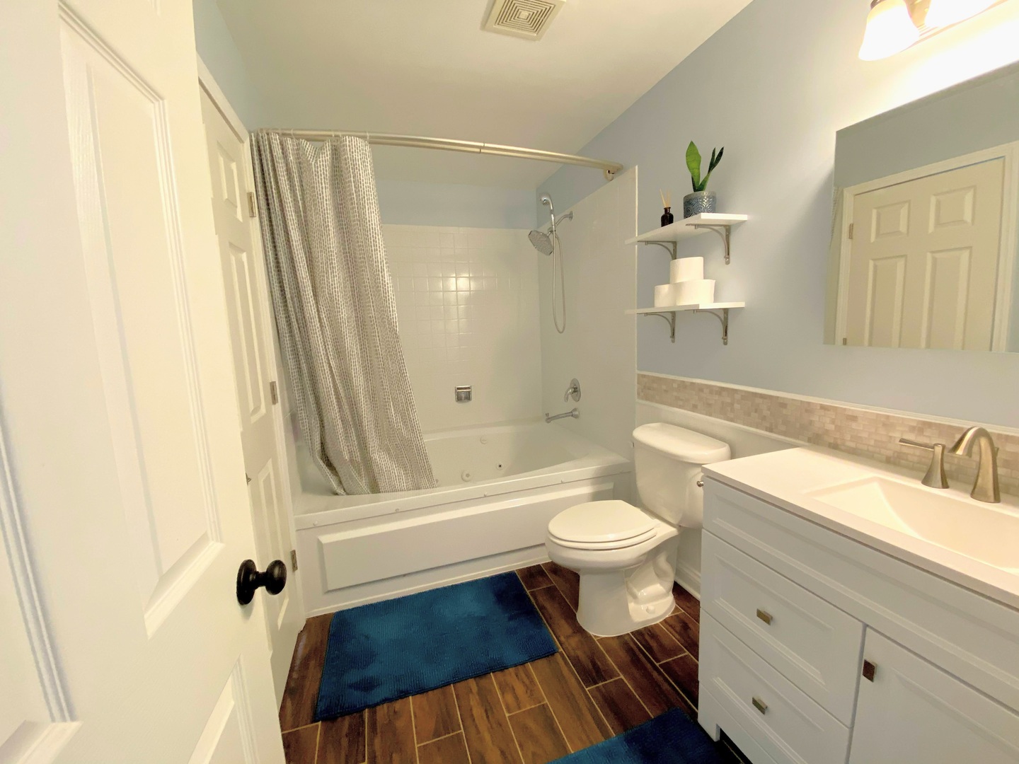 1214 Needham Road Naperville, IL 60563 - Photo 17 of 25 a bathroom with a sink a toilet and a bathtub