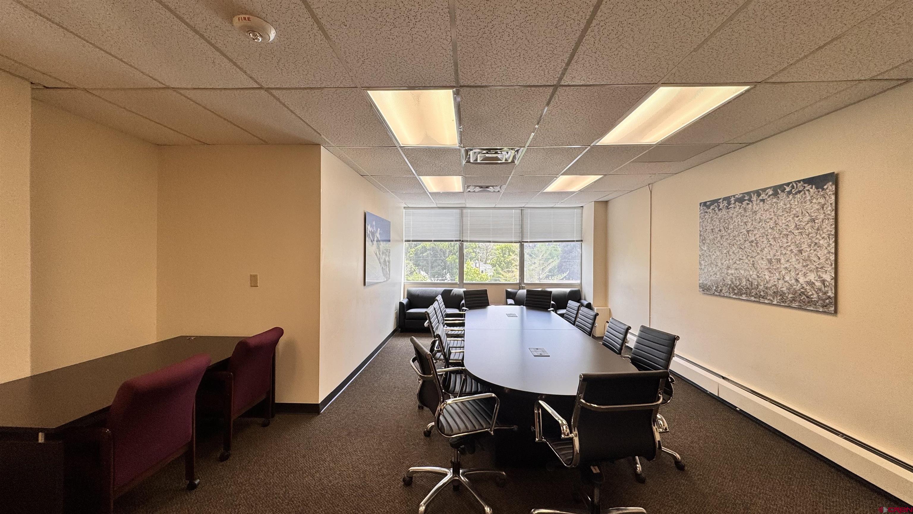 835 East 2nd Avenue, Unit 400 Durango, CO 81301 - Photo 17 of 20 a view of a dining room with furniture window and outside view