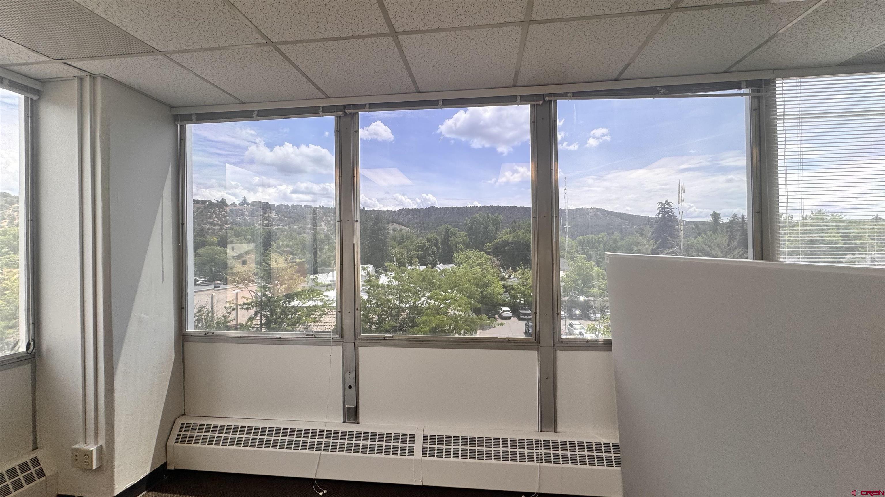 835 East 2nd Avenue, Unit 400 Durango, CO 81301 - Photo 8 of 20 a view of a room that has a large window and front door