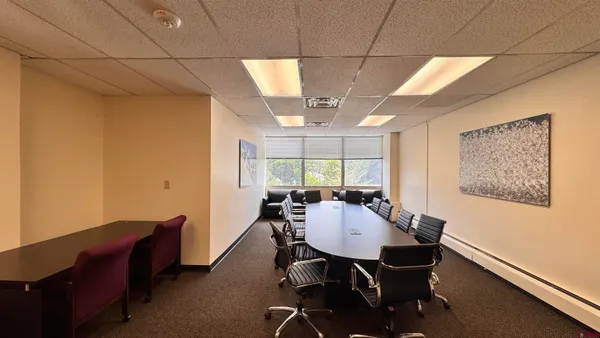 an empty room with windows