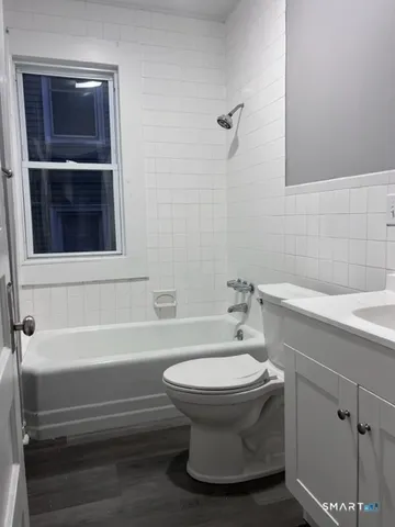 a bathroom with a sink and bathtub