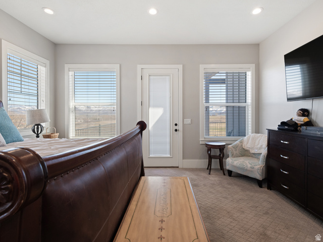 641 West 500 South Midway, UT 84049 - Photo 23 of 52 Carpeted bedroom with multiple windows, recessed lighting, and a glass-paneled door