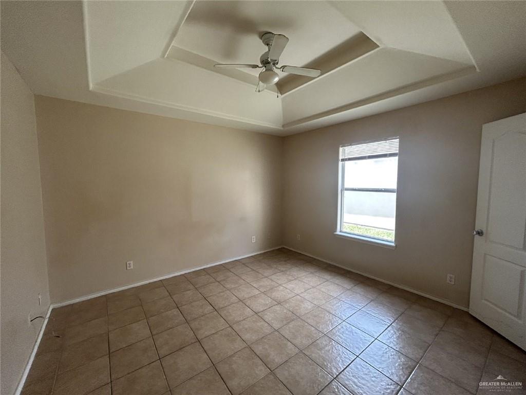 1803 Douglas, Unit 3 Pharr, TX 78577 - Photo 7 of 11 a view of an empty room with a window